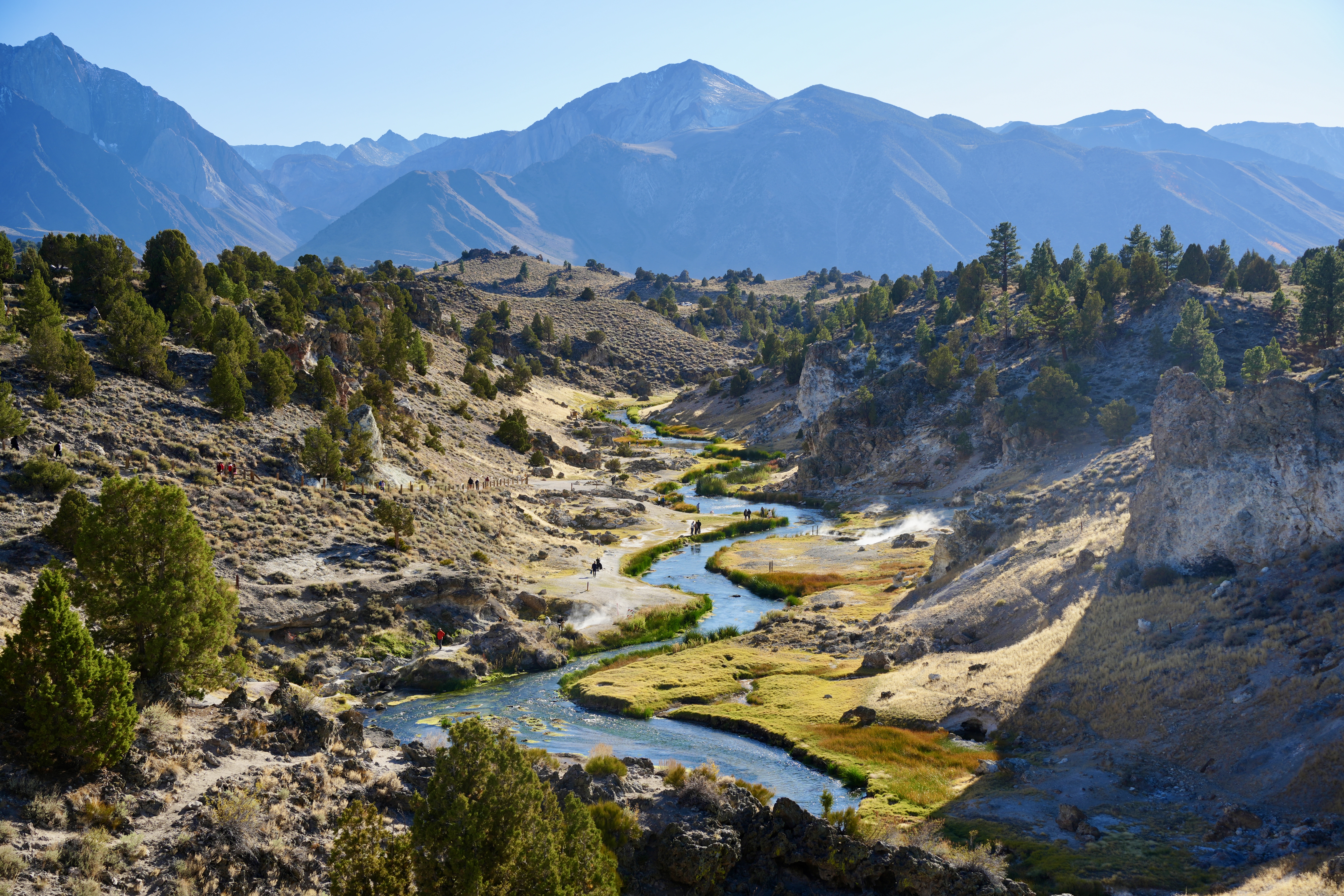 Hot Creek winding through a high-desert canyon beneath the Eastern Sierra