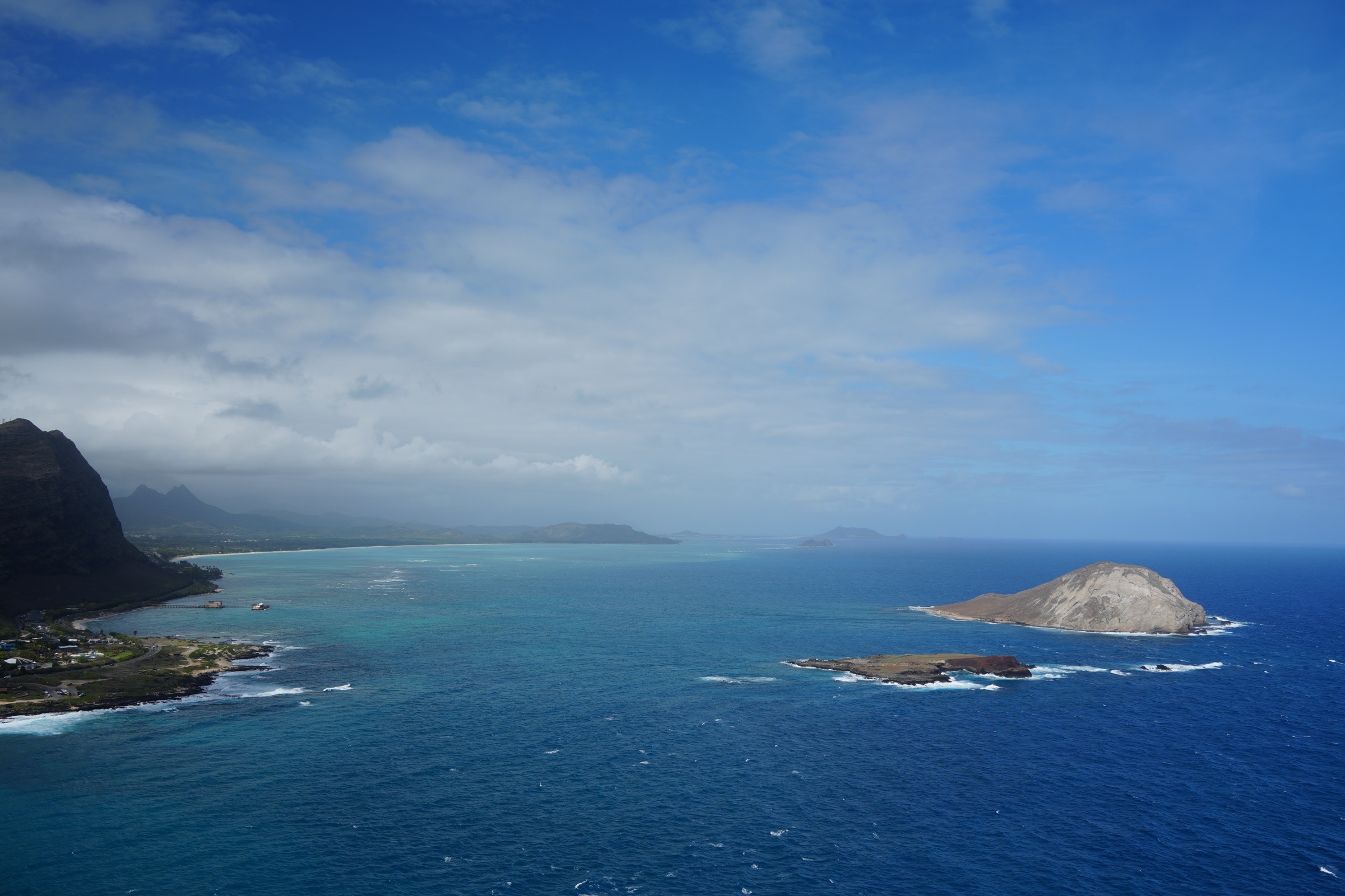 Mānana and Kāohikaipu islets in deep blue water off Oʻahu's windward coast